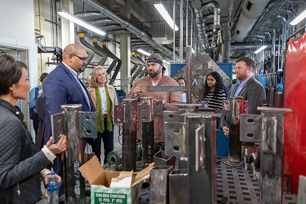 Students demonstrating what they have learned in programs benefiting from Johnson Controls Community College Partnership Program.